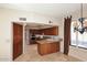 Kitchen with granite countertops and wood cabinetry at 23014 N 86Th St, Scottsdale, AZ 85255