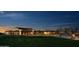 Evening view of community center with string lights at 36131 N Desert Tea Dr, Queen Creek, AZ 85140