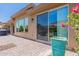 Backyard patio with sliding glass door access at 36131 N Desert Tea Dr, Queen Creek, AZ 85140