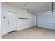Attached garage with automatic door opener and extra storage at 36131 N Desert Tea Dr, Queen Creek, AZ 85140