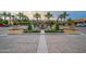 Community entrance with fountain and lush landscaping at 36131 N Desert Tea Dr, Queen Creek, AZ 85140
