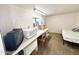 Small bedroom with twin bed and microwave at 155 S Limestone Dr, Apache Junction, AZ 85119