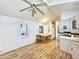 Open concept kitchen with ample cabinets and laminate flooring at 155 S Limestone Dr, Apache Junction, AZ 85119