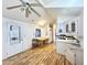 Kitchen boasts ample cabinetry, laminate flooring and a breakfast bar at 155 S Limestone Dr, Apache Junction, AZ 85119