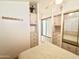 Bright bedroom includes mirrored closet doors and a ceiling fan at 155 S Limestone Dr, Apache Junction, AZ 85119