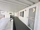 Covered patio with access to the home and storage at 155 S Limestone Dr, Apache Junction, AZ 85119