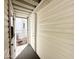 Covered patio with access to the home and storage at 155 S Limestone Dr, Apache Junction, AZ 85119