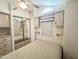 Spacious bedroom with mirrored closet doors and ceiling fan at 155 S Limestone Dr, Apache Junction, AZ 85119