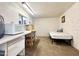 Small bedroom with twin bed and microwave at 155 S Limestone Dr, Apache Junction, AZ 85119