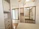 Well-lit bedroom with mirrored closet doors and ceiling fan at 155 S Limestone Dr, Apache Junction, AZ 85119