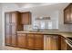 Updated kitchen featuring wood cabinets and granite countertops at 5732 N 25Th St, Phoenix, AZ 85016