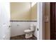 Small powder room with white subway tile and modern toilet at 8100 E Camelback Rd # 178, Scottsdale, AZ 85251