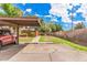 Covered carport parking with additional open parking at 5921 W Golden Ln, Glendale, AZ 85302