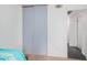 Bedroom with a closet and access to the hallway at 5921 W Golden Ln, Glendale, AZ 85302