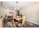 Formal dining room with a large table and hardwood floors at 2946 W Amber Sun Dr, Phoenix, AZ 85085