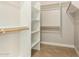 Walk-in closet with shelving and hanging rods at 1940 S Talbot Cir, Mesa, AZ 85209