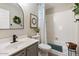 Clean bathroom with tub and updated vanity at 14194 W Mountain Laurel Trl, Surprise, AZ 85374