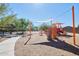 Community playground with play structures, shade, and walking paths at 2946 W Amber Sun Dr, Phoenix, AZ 85085