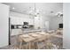 Open concept kitchen and dining area with modern cabinetry and island at 901 S Smith Rd # 1012, Tempe, AZ 85281