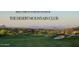 Aerial view of Desert Mountain Club golf course with scenic mountain backdrop at 42035 N 113Th Way, Scottsdale, AZ 85262