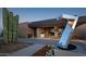Modern community entrance with a unique metal sculpture at 42035 N 113Th Way, Scottsdale, AZ 85262