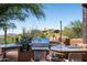 Outdoor kitchen with grill, sink, and ample counter space at 42035 N 113Th Way, Scottsdale, AZ 85262