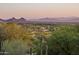 Scenic view of mountain range and residential area at 42035 N 113Th Way, Scottsdale, AZ 85262