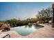 Inviting infinity pool with flagstone patio and scenic mountain views at 42035 N 113Th Way, Scottsdale, AZ 85262