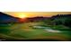 Stunning sunset view over a beautifully landscaped golf course at 42035 N 113Th Way, Scottsdale, AZ 85262