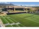 Well-maintained tennis courts with spectator seating at 42035 N 113Th Way, Scottsdale, AZ 85262