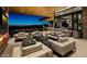 Upscale outdoor lounge with mountain views and fireplace at 42035 N 113Th Way, Scottsdale, AZ 85262