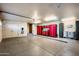 Finished garage with storage cabinets and EV charger at 42035 N 113Th Way, Scottsdale, AZ 85262
