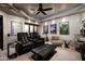 Home theater room with seating for multiple viewers and a projector at 42035 N 113Th Way, Scottsdale, AZ 85262