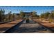 Well-lit bocce ball court with string lights at 42035 N 113Th Way, Scottsdale, AZ 85262