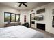 Bedroom with king-size bed, ensuite bathroom access, and mountain views at 42035 N 113Th Way, Scottsdale, AZ 85262