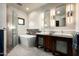 Spa-like bathroom with soaking tub, double vanities, and glass shower at 42035 N 113Th Way, Scottsdale, AZ 85262