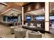 Elegant indoor lounge with comfortable seating and bar at 42035 N 113Th Way, Scottsdale, AZ 85262