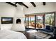 Main bedroom with a fireplace and stunning views at 42035 N 113Th Way, Scottsdale, AZ 85262