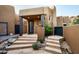 Exterior view of the home with stone steps and landscaping at 42035 N 113Th Way, Scottsdale, AZ 85262