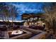 Expansive outdoor patio with fire pit and comfortable seating at 42035 N 113Th Way, Scottsdale, AZ 85262