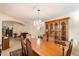 Bright dining room featuring a large wooden table and hutch at 1425 E Sunset Dr, Casa Grande, AZ 85122