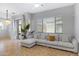 Living room with large windows and comfortable sectional sofa at 15240 N 142Nd Ave # 2111, Surprise, AZ 85379