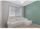 Bedroom with L-shaped sofa and light walls at 15240 N 142Nd Ave # 2111, Surprise, AZ 85379