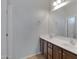 Double sink bathroom vanity with large mirror at 15240 N 142Nd Ave # 2111, Surprise, AZ 85379