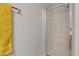Bathroom with shower and yellow towel at 15240 N 142Nd Ave # 2111, Surprise, AZ 85379