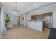 Open kitchen with island, stainless steel appliances, and breakfast bar at 15240 N 142Nd Ave # 2111, Surprise, AZ 85379