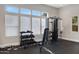 Well-equipped community gym with various weight machines and free weights at 15240 N 142Nd Ave # 2111, Surprise, AZ 85379
