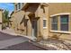 Townhouse style home with front entrance and walkway at 15240 N 142Nd Ave # 2111, Surprise, AZ 85379