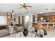Open concept kitchen and living area with island and modern appliances at 8420 N 15Th St, Phoenix, AZ 85020