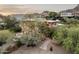 Elevated view of home and surrounding landscape at dusk at 8420 N 15Th St, Phoenix, AZ 85020